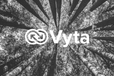 Vyta sustainable IT solutions, logo infront of trees